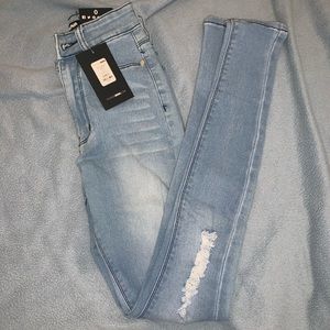 Fashion nova light blue ripped jeans